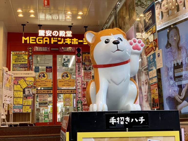 Cartoon Hachiko statue in front of Mega Donki in Shibuya