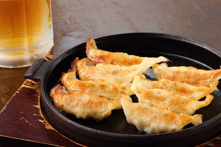 Gyoza dumplings and beer