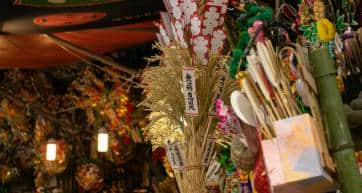 ornamental rakes decorated with lucky charms for sale during the Tori no Ichi (Rooster Market) at Hanazono Shrine in Shinjuku