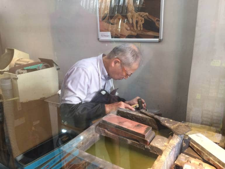 Kamata repairing a knife