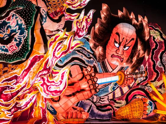 colorful Japanese float in a parade