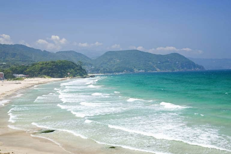 Sandy and crystal clear water of Shirahama Beach