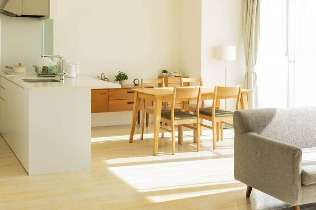 small dining room with view of kitchen and sofa