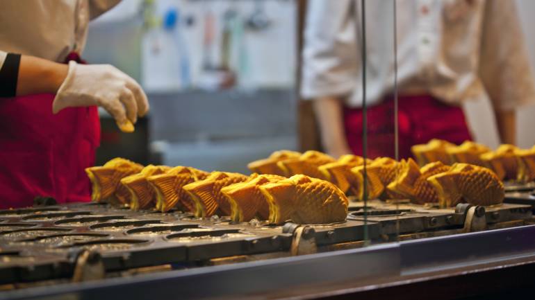 Taiyaki is Japanese fish shaped cake filled with sweet red bean paste.