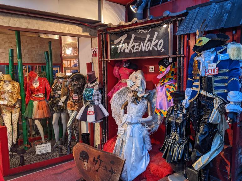 shop front with many elaborate costumes