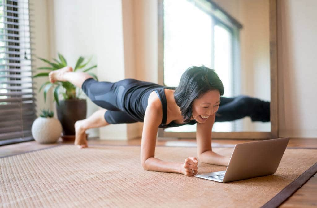 Woman doing yoga at home